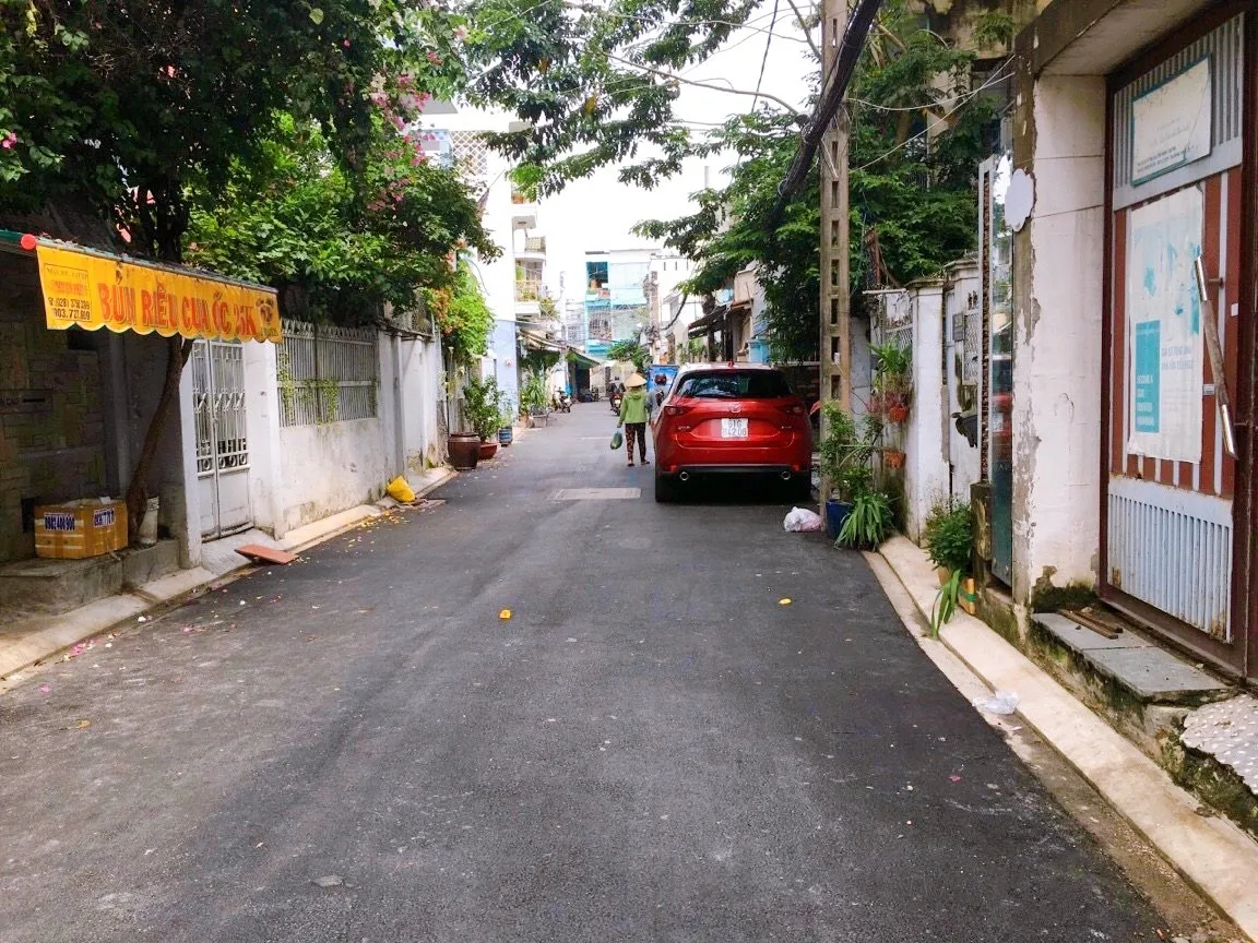 Giá bán nhà riêng, nguyên căn đường Văn Cao, Quận Tân Phú hiện tại là bao nhiêu?